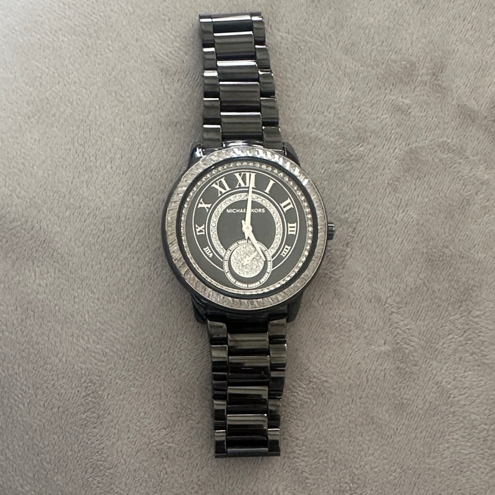 Michael Kors women’s black stainless steel Watch with crystals.